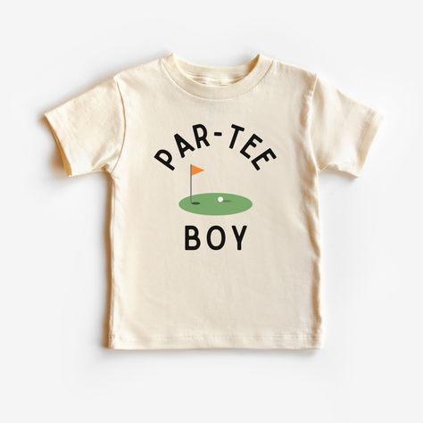 This cute Par-tee boy t shirt is 100% cotton, has a tear away tag for your child's comfort and comes in 3 Bella Canvas colors. In sizes 2T-5T, choose black, white or natural to make this golf birthday party shirt the perfect addition to your golf loving boy's birthday party! DETAILS .100% Cotton .Bella Canvas tee .Tear away label .Runs true to size .Props in any photos are not included and are for styling purposes only .Colors may slightly vary from styled photos  SIZING This graphic tee design Putt Putt Birthday Party, Par Tee Birthday Party, Golf Themed 2nd Birthday Party, Par 3 Birthday Party, Golf Second Birthday Party, Golf 2nd Birthday Party, Par 3 Golf Birthday Party, Par Three Golf Birthday, Par Tee Golf Party