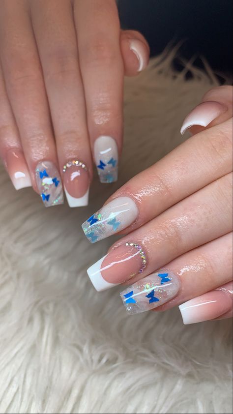 White With Blue Butterfly Nails, Blue And White Butterfly Nails, White Nails With Blue Butterflies, Blue Butterfly Nails Acrylics, Blue Butterfly Nails Short, Baby Blue Butterfly Nails, Nail Designs Butterflies, Butterfly Nails Short, Cute Baby Blue Nails