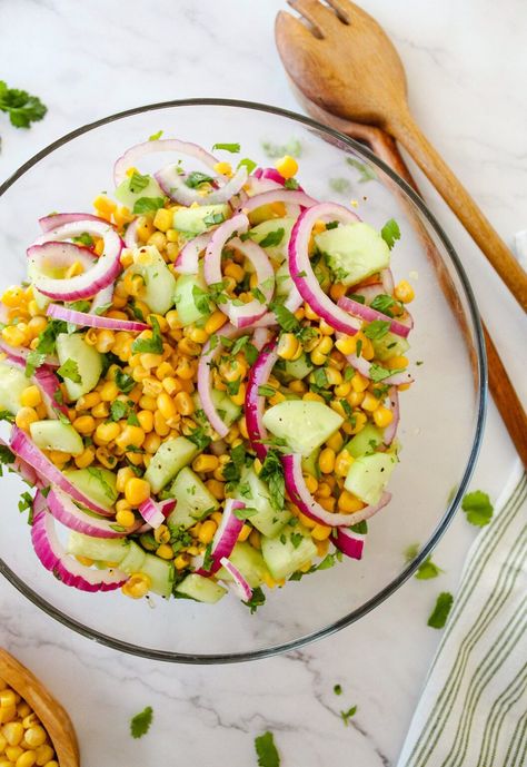 Sweet summer corn, crisp tomatoes and vibrant red onion make this corn and cucumber salad the perfect salad for picnics and gatherings all season long! It's fresh, flavorful and quick to prepare with a simple dressing in only 15 minutes. Cucumber And Corn Salad, Vegan Kabobs, Vegan Superbowl Snacks, Salads For Picnics, Zucchini Dinner Recipes, Picnic Salad, Fresh Corn Salad, Taco Lettuce Wraps, The Perfect Salad