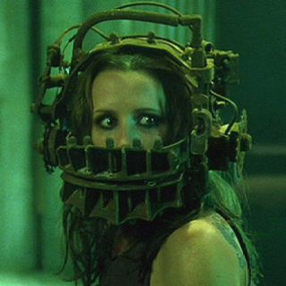 Saw Amanda Reverse Bear Trap, Saw Movie Scenes, Saw Icon Movie, Saw Traps Jigsaw, Amanda From Saw, Iconic Horror Movie Scenes, Saw Bear Trap, Amanda Saw, Saw Amanda