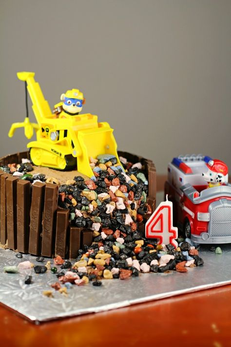 rubble paw patrol cake | chocolate single tier round with age candle and marshall in bulldozer topper and candy rocks and kit kat Game Of Thrones Birthday, Moana Birthday Cake, 12th Birthday Cake, Minion Birthday Cake, Paw Patrol Birthday Cake, Construction Cake, Paw Patrol Cake, Paw Patrol Birthday Party, Minion Birthday