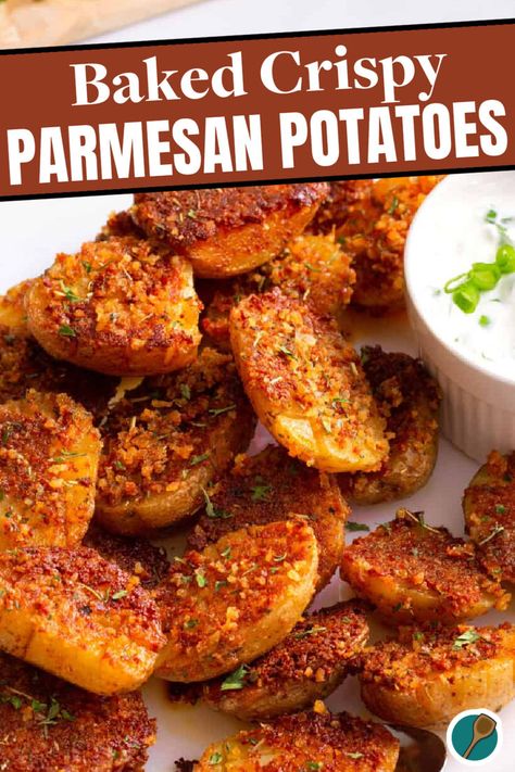 A plate of crispy parmesan potatoes topped with Italian seasoning and served with a side of dipping sauce. Crispy Spicy Potatoes, Parmesan Sweet Potatoes Baked, Wings Sides, Cheesy Potato Side Dishes, Smashed Potatoes Baked, Crispy Parmesan Potatoes, Parmesan Crusted Potatoes, Easy Roasted Potatoes, Potato Appetizers