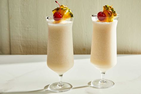 Hennessy Colada Recipe - NYT Cooking Henny Colada Recipe, Henny Colada, Southern Fried Corn, Pimento Cheese Dip, Okra And Tomatoes, Coco Lopez, Cream Of Coconut, Pineapple Glaze, Lemon Loaf Cake