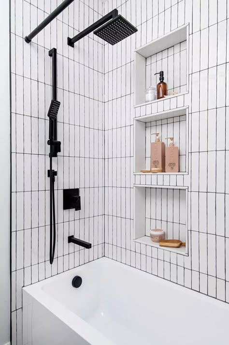 26 Bathtub Tile Ideas to Give Your Shower-Tub Combo a Custom Feel Tubs With Tiled Walls, Subway Tile In Bathtub, Shower Tub Niche Ideas, Shower Tub Combo Niche Ideas, Small Bathroom With Tub And Shower Stall, Tub And Shower Remodel, Modern Shower Tub Combo, Tile Shower Tub Combo, Tile Behind Tub