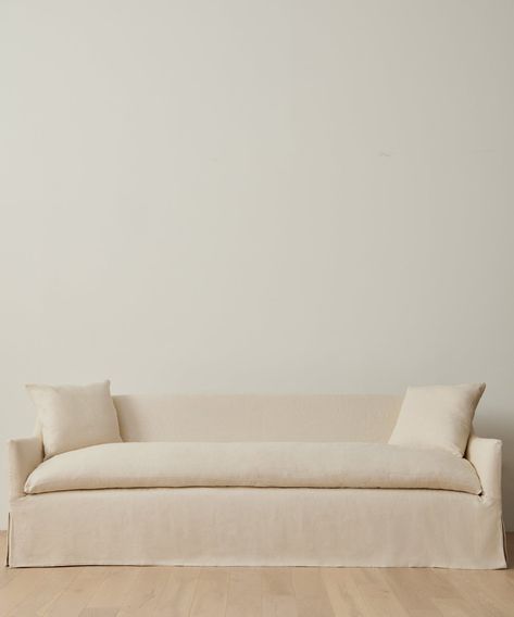 Miramar Sofa Pearl Linen Elegant sofa crafted from luxurious Belgian Libeco linen: 100% linen slipcover. Features feather down fill and foam core. Handmade in the USA, the Miramar Sofa boasts an elevated look and a lived-in, softer feel—the perfect piece to round out any living space with the touch of California ease. For furniture purchases, please refer to our furniture inspection policy here, and for help styling this piece in your space, contact styling@jennikayne. com for a complimentary co White Linen Couch, Libeco Linen, Natural Linen Sofa, Linen Slipcover, Linen Couch, Narrow Entryway, Furniture Dimensions, Elegant Sofa, Sofa Size