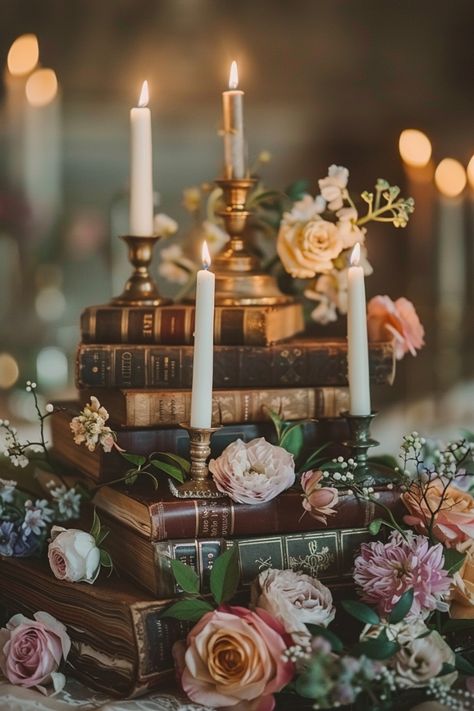 Book centerpieces are perfect for literary lovers, adding a personal touch to the wedding decor. See more ideas here. Book Wedding Cake Topper, Vintage Book Wedding Decor, Pride And Prejudice Wedding Decorations, Romance Theme Wedding, Literature Themed Wedding, Dark Acadamia Weddings, Antique Wedding Centerpieces, Antique Wedding Ideas, Book Lover Bridal Shower Ideas