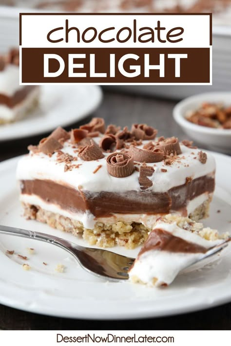 This easy Chocolate Delight recipe creates a delicious layered pudding dessert that feeds a crowd. Made with a pecan shortbread crust and layers of cream cheese, chocolate pudding, and Cool Whip topped with chocolate curls for decoration. Husband Delight Dessert, Layered Chocolate Dessert, Chocolate Dream Dessert, Dessert With Pudding And Cool Whip, Four Layer Chocolate Dessert, Layered Desserts With Cream Cheese, Chocolate Heaven Dessert, Chocolate Pudding Cream Cheese Dessert, Chocolate Pudding Cool Whip Dessert