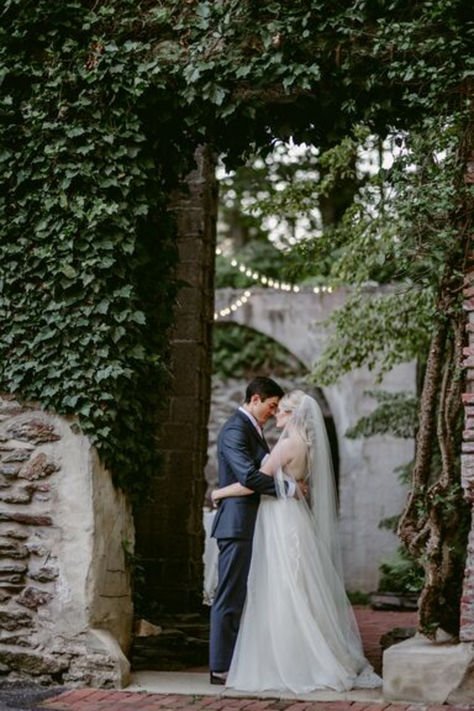 Bride and groom embrace in alcove within the stone ruins courtyard outside at The Old Mill Delaware County Pennsylvania wedding venue. Old Mill Wedding, Pa Wedding Venues, Hotel Ballroom, Mill Wedding, Cocktail Reception, Wedding Reception Venues, County Wedding, Outdoor Wedding Venues, Reception Venues