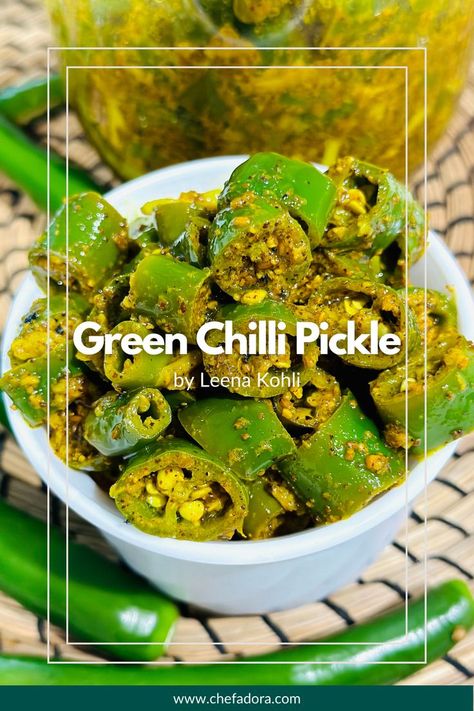 This Green Chili Pickle recipe by @spicenicebyleena perfectly blends tangy and spicy flavours that complement any meal. Serve it as a spicy side, or pair it with your favourite sandwich. #chefadora #indian #recipes #sides #vegan #vegetarian #glutenfree #spicy #chilli #pickle #easy #quickandeasy #easyspicy #achaar Chili Pickle Recipe, Chilli Pickle Recipe, Green Chilli Pickle, Chilli Pickle, Recipes Sides, Spicy Chilli, Pickle Recipe, Nigella Seeds, Green Chili