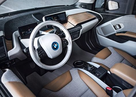 BMW i3 electric car Bmw I3 Interior, Car Dealership Decor, Family Cars Suv, Bmw I3 Electric, Bmw Electric Car, Smart Car Accessories, All Electric Cars, Cars Photography, Cars Interior