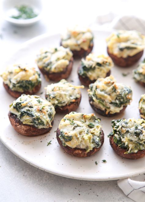 Spinach and artichoke stuffed mushrooms are a delicious appetizer that’ll be a winner at any party! Looking for an appetizer that’s sure to please a crowd? These mushrooms stuffed with cream cheese, Parmesan, artichoke hearts, and spinach is a delicious and easy appetizer that won’t last long at any party. It’s like spinach-artichoke dip taken to … Artichoke Stuffed Mushrooms, Parmesan Artichoke, Monday Meals, Artichoke Stuffed, Mushrooms Stuffed, Completely Delicious, Cheese Stuffed Mushrooms, Keto Appetizers, Staff Party