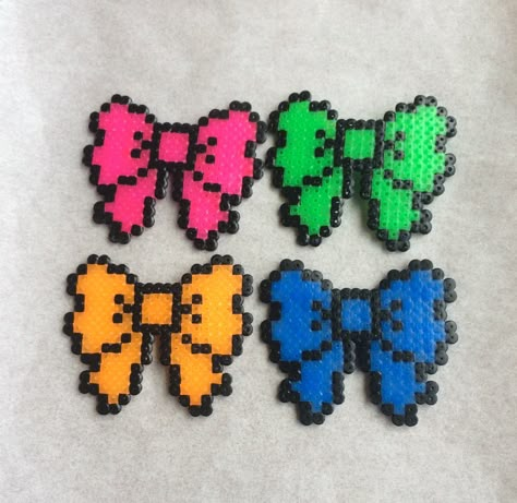 Neon Perler Bead Patterns, Glow In Dark Perler Beads, Perler Bead Hair Clip, Perler Bead Hair Bows, Kandi Hair Clips, Yami Kawaii Perler Beads, Bow Beads, Hair Bow Clips, Orange Neon