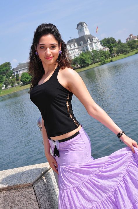 Tamanna sexy in Vengai movie Tamana Bhatiya Bold, Bollywood Girls, Indian Actress Hot Pics, Indian Beauty Saree, A Woman, Blogger, Skirt, Purple, Water