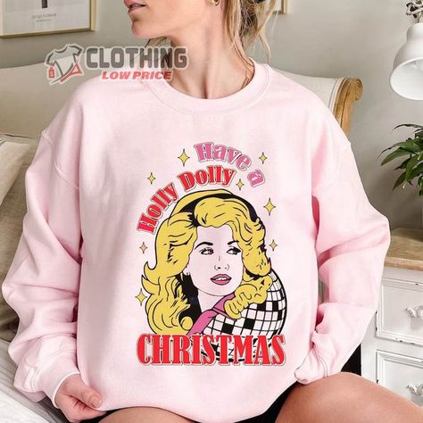 Santa Dolly Sweatshirt, Dolly Parton Christmas Cowboy Merch, Dolly Parton Trending Tee, Dolly Parton Christmas Fan Gift Check more at https://clothinglowprice.com/product/santa-dolly-sweatshirt-dolly-parton-christmas-cowboy-merch-dolly-parton-trending-tee-dolly-parton-christmas-fan-gift/ Dolly Sweatshirt, Dolly Parton Christmas, Christmas Cowboy, Holly Dolly, Dolly Parton, Cowboy, Fan, Sweatshirts, Christmas