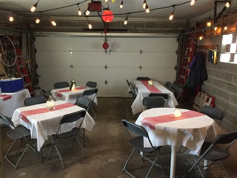 We needed more seating for Christmas dinner so we set up tables and chairs in the garage Small Garage Party Set Up Ideas, Thanksgiving In Garage, Garage Party Set Up Ideas Birthday, Party Seating Ideas For Small Spaces, Thanksgiving Garage Set Up, Decorate Garage For Christmas Party, Garage Party Set Up Ideas, Decorate Garage, Garage Party Decorations