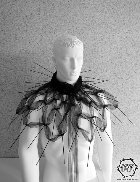 A SIGN OF COSMIC EXPANSION The Crown in the pictures can be found on the following link: https://etsy.me/2Gdjq0t + The base of this Shoulder wrap / Spike Capelet is made from high quality tule and zip ties + + The Shoulder wrap / Capelet is very soft, flexible, really comfortable to wear + + One size fits all + + The Capelet is secured on the back with a ribbon/knot + + It can be worn in various styles + + Explore the rest of my outstanding collection + Thank you for choosing Ziptie Jewelry, Ren Ap Portfolio, Fancy Fits, King Outfit, Sculptural Fashion, Halo Headband, Wedding Headdress, Gold Headpiece, Vintage Blog, Body Adornment