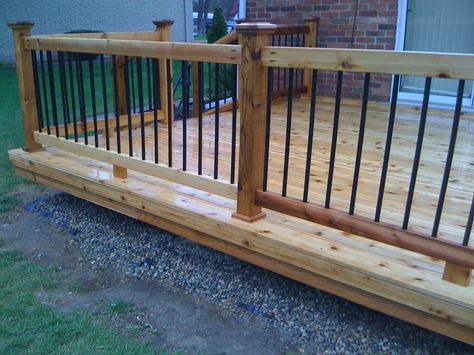 Railing and baluster ideas ( Deckorators ... Wood Porch Railings, Wood Deck Designs, Wood Deck Railing, Metal Deck Railing, Deck Railing Ideas, Deck Balusters, Deck Railing Design, Metal Deck, Railing Ideas