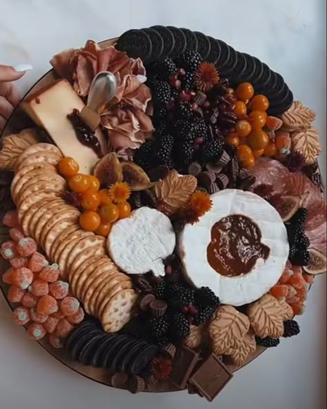 Autumn Fruit Tray, Pink And Black Charcuterie Board, Disney Halloween Charcuterie Board, Red And Black Charcuterie Board, Brown Food Board Ideas, Wednesday Addams Charcuterie, Brown Charcuterie Board Ideas, Twilight Charcuterie Board, Fall Charcuterie Board Dessert