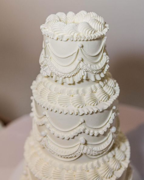 Vintage Cakes Htx, LLC | thought I’d share this timeless three tiered vintage wedding cake made with our lush white chocolate swiss meringue a must on your wedding... | Instagram All White Vintage Wedding Cake, Vintage Theme Wedding Cake, White Vintage Wedding Cake, Wedding Cake Vintage, Victorian Wedding Cakes, White Vintage Wedding, Vintage Cake Topper, Bridal Cakes, Vintage Wedding Cake