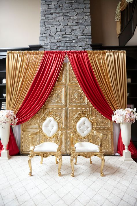 Top Wedding Decor Calgary is a premier event design house that offers styling and wedding decor services, including floral arrangements, specialty linens, rental furniture, specializing in the South Asian market. Our style affinity is more fusion, and less traditional to cater to today's generation of newlyweds. Punjabi Wedding Backdrop, Backdrop Draping, Haldi Decoration Ideas, Haldi Decoration, Indian Wedding Theme, Reception Stage, Vinyl Wall Panels, Reception Stage Decor, Fabric Decoration