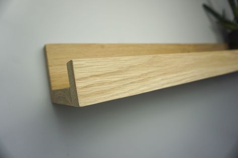 Oak picture ledge shelf handmade in the UK. Chunky design and available in a range of lengths and wax finishes. Handmade in the UK to a smooth, clean finish. This oak picture ledge is perfect for displaying ornaments, photo frames, and pictures. Strong construction with solid, planed timber, and domino joints. Hand-sanded before completion or applying a wax finish of your choice. These Oak picture ledge shelves are ideal for dining rooms, living rooms, bedrooms, entrance/hallways, or any other r Picture Ledge Shelves, Upside Down Pictures, Displaying Ornaments, Entrance Hallways, Deep Picture, Shelf Ledge, Picture Ledge Shelf, Photo Ledge, Picture Shelf