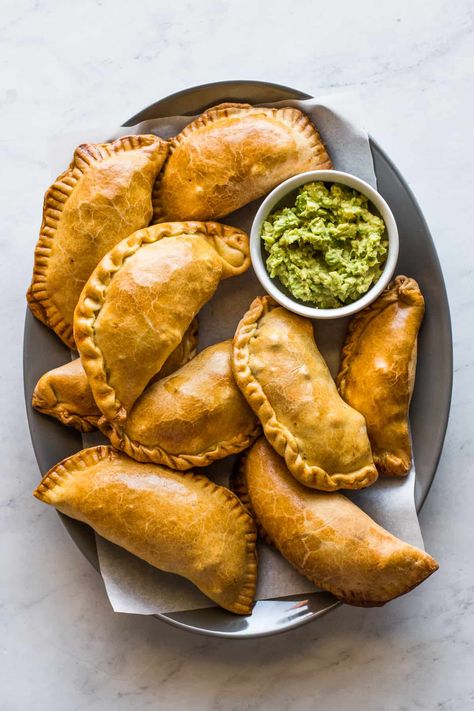 Easy beef empanadas made with a crisp and flaky crust filled with a savory ground beef picadillo and cheese filling. Easy Mexican Recipes, Beef Empanadas Recipe, Beef Picadillo, Enchilada Sauce Easy, Isabel Eats, Empanada Recipe, Beef Empanadas, Recipes Authentic, Savory Pies