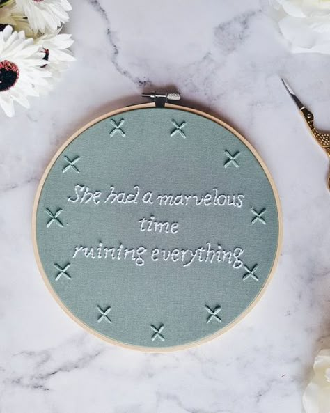 Taylor Swift inspired embroidery hoop. Aqua fabric with text saying She had a marvelous time ruining everything in white thread Taylor Swift Lover Embroidery, She Had A Marvelous Time Ruining Everything, Taylor Swift Lyric Embroidery, Taylor Swift Lyrics Embroidery, Taylor Swift Inspired Embroidery, I Had A Marvelous Time Ruining Everything Taylor Swift, Taylor Swift Embroidery Pattern, Taylor Swift Embroidery Ideas, Swiftie Crafts