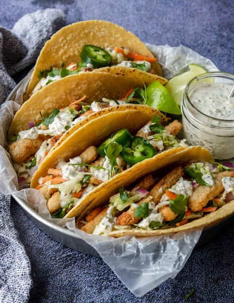 Super easy fish tacos made with frozen fish sticks! Bonus recipes for a Cilantro Lime Slaw and Jalapeno Tartar Sauce to build the best taco! Fish Sticks Recipes, Fish Stick Tacos, Tacos With Slaw, Cilantro Slaw, Lime Slaw, Tacos Easy, Easy Fish Tacos, Easy Sticks, Cilantro Lime Slaw