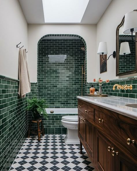 Photography of bathroom with green subway tiles Tiled Alcove Bathtub, Bath In Alcove, Bathroom Remodel Green Tile, Green Tile Bathtub, Bathtub With Tile Walls, Tiled In Bath, Bathroom Alcove Ideas, Unique Tile Bathroom, Mixed Tile Bathroom