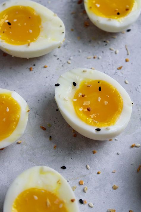 sheet with jammy eggs cut in half sprinkled with seasoning. Soft Boiled Eggs Recipe, Protein Filled Snacks, Peanut Butter Ramen, Cursed Doodles, Jammy Eggs, Perfect Boiled Egg, Ramen Dishes, Boiled Egg Diet, Soft Boiled Eggs