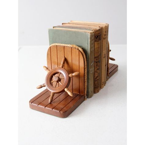 Sail the high seas, without ever leaving your bookshelf! These vintage ship wheel bookends will add a splash of fun and nautical charm to your library. Crafted with wood frames and rope trim, these stylish bookends come complete with convenient felt bases, perfect for keeping your books afloat. Ahoy, matey! Nautical Vintage Decor, Vintage Nautical Aesthetic, Sailboat Nursery Baby Boy, Vintage Nautical Nursery, Vintage Lake House Decor, Ship Mobile, Ocean Baby Rooms, Sailor Room, Boat Nursery