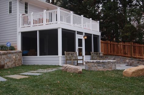 This custom deck, screened-in porch, and patio combination was built in Chevy Chase, Maryland. The screened room is located beneath the deck, a nifty design element that both added and conserved space in an otherwise confined area. A water proof system is installed beneath the deck to to keep the screened porch dry. Porch Under Deck, Patio Under Decks, Screen Porches, Porch And Patio, Under Deck, Deck And Patio, Screened Porch Designs, Three Season Porch, Building A Porch