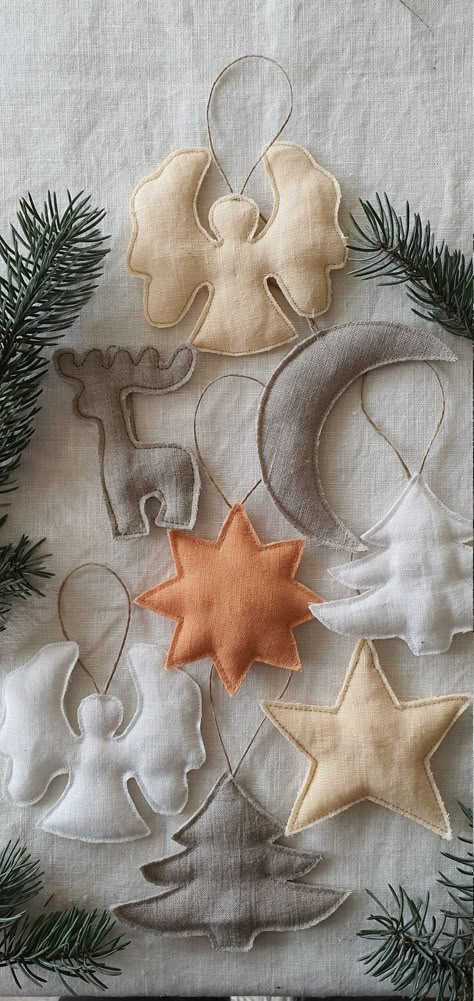 For your attention - our new handmade product - Christmas linen decorations for Christmas tree. Hope you will like them - they are really cute and attractive. But that is not only for fun! As all productions we have wastes and remnants of different materials. But we are care about our planet a lot and were thinking how to use them usefully. And that is the story how they appeared in our shop. Please find different figures in different colors of linen. We created next lovely toys: - stars - heart Diy Organic Christmas Decorations, Handmade Christmas Toys For Tree, Folk Christmas Decor, Christmas Textile Decorations, Organic Christmas Decorations, Linen Christmas Decorations, Christmas Toys Handmade, Handmade Christmas Aesthetic, Natural Decorated Christmas Tree