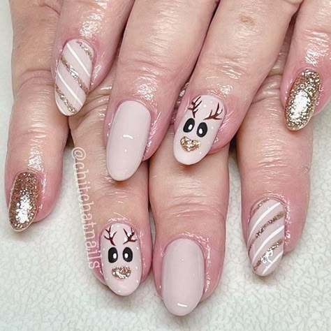 30 Christmas Nail Art Designs You Will Want to Copy Christmas Nails Rain Deer, Rain Deer Nails, Deer Nail Designs, Christmas Reindeer Nails, Deer Nail Art, Reindeer Nails, Deer Nails, Winter Nail Art Designs, Nail Polish Art Designs