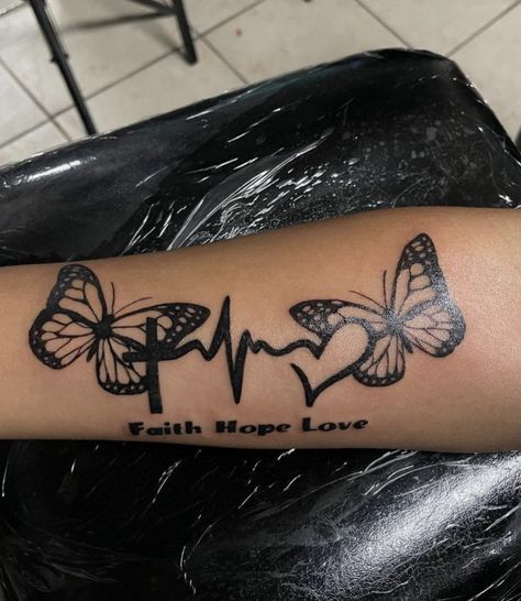 Butterfly Heartbeat Tattoo, Small Butterfly Memorial Tattoo, Heart Wrist Tattoos For Women Unique, Sister Memorial Tattoos Butterflies, Butterfly And Heart Tattoo Ideas, Butterflies Going Up Arm Tattoo, Rip Butterfly Tattoos, Memorial Arm Tattoos For Women, Butterfly Name Tattoos For Women