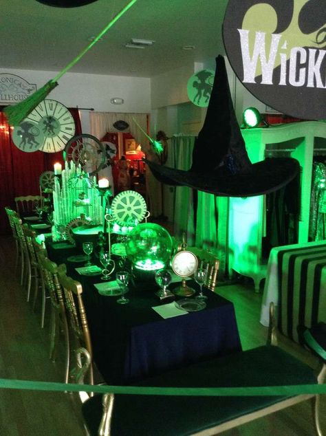 Wicked Party | CatchMyParty.com Wicked Halloween Decor, Wicked Musical Party Decorations, Emerald City Theme Party, Wicked Musical Party Ideas, Wicked Musical Themed Party, Wicked Movie Party, Wicked Musical Birthday Party, Wicked Party Decorations, Wicked Themed Birthday Party