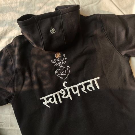 Ndy custom made hand embroided hoodie,here is the back of hoodie where we have embroided customed hindi font 'swarthparta' for our client which means selfless Embroidered Clothes, Satin Stitch, Hand Embroidered, The Back, Satin, T Shirts For Women, Sweatshirts, Women's Top, Clothes