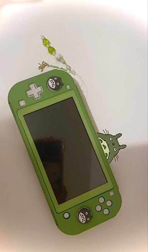 #totoro #switchlite #aesthetic #green #cottagecore #kawaii #studioghibli #totoro #acnh Device Aesthetic, Nintendo Switch Design Ideas, Nintendo Switch Case Aesthetic, Nintendo Switch Decoration, Green Totoro, Totoro Acnh, Nintendo Switch Decoration Ideas, Aesthetic Nintendo Switch Case, Nintendo Switch Aesthetic Green