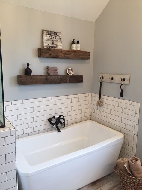 Barn wood floating shelves, hanging shelve, and diy relax sign. Decor Over Tub Bathroom, Bathroom Shelves Over Bathtub, Over Bathtub Shelves, Above Tub Shelves, Bathtub Floating Shelves, Shelves Above Bathtub Wood, Shelf Above Bath, Floating Shelves Over Bathtub, Bathroom Shelving Above Tub