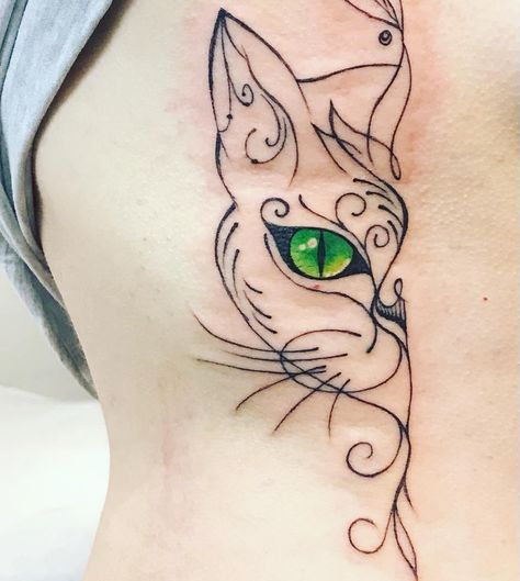 A minimalistic, linework cat tattoo done by @jenskinart! Love the green in the eyes, and the fine lines that were used to make half of a cat face! Half Cat Face Tattoo, Cat Eye Tattoos, Cat Face Tattoos, Cat Outline Tattoo, Cat Paw Tattoos, Minimalist Tattoo Design, Cat And Dog Tattoo, Watercolor Tattoo Ideas, Minimalistic Tattoos