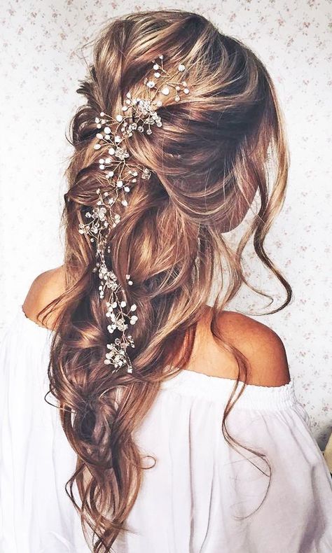 Planning on wearing a wedding dress with an open back or something with a back detail? Opt for a classic up-do hairstyle to show-off your beautiful wedding day look.   18 Most Romantic Bridal Updos And Wedding Hairstyles  ❤ See more: http://www.weddingforward.com/romantic-bridal-updos-wedding-hairstyles/ Romantic Bridal Updos, Hairstyles Bride, Boho Bridal Hair, Flowers In Her Hair, Bridal Hairstyles, Bridal Updo, Boho Bridal, Wedding Hair And Makeup, Hair Dos