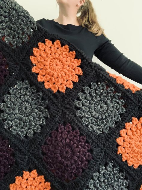 Fall Inspired Crochet Blanket, Quick Granny Square Crochet Blanket, Halloween Themed Crochet Blankets, Goth Crochet Blanket Patterns Free, Super Chunky Granny Square Blanket, Fall Colours Crochet Blanket, Pokeball Granny Square, Crochet Sunburst Granny Square Pattern, Crochet Sunburst Blanket