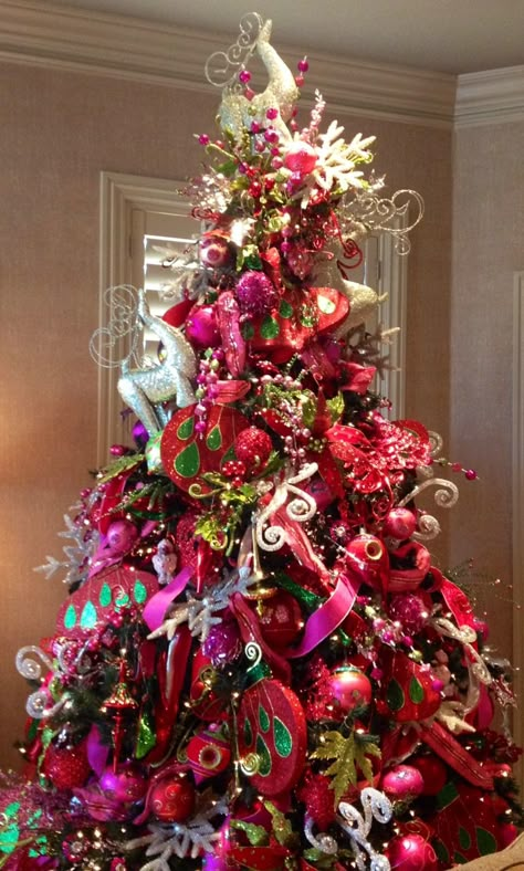 Christmas tree - red with accents of green, silver, and gold Hot Pink And Gold Christmas Tree, Red And Pink Christmas Tree, Reindeer Running, Hot Pink Christmas Tree, Hot Pink Christmas, Pink Christmas Tree Decorations, Bungalow Designs, Green Christmas Tree Decorations, Red And Gold Christmas Tree