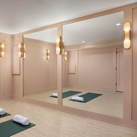 Blush pink walls and alabaster sconces give this home yoga studio a beautiful glow for daily practice 🧘 Interior by @amycarmandesign… | Instagram Pink Yoga Room, Beautiful Dance Studio, Home Barre Studio, Pink Workout Room, Girly Home Gym, At Home Dance Studio, Pink Pilates Studio, Wellness Interior Design, Pink Yoga Studio