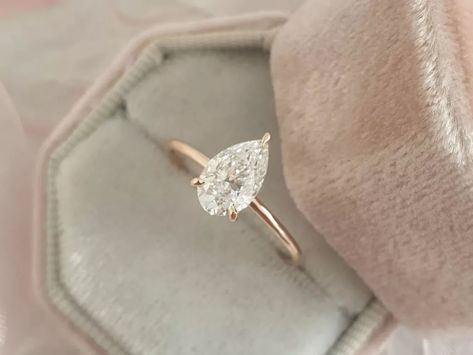 37 Pear Shaped Engagement Rings We're Obsessed With Pear Moissanite Engagement Ring, Solitaire Wedding Ring, Cute Engagement Rings, Pear Shaped Engagement Rings, Future Engagement Rings, Pear Ring, Teardrop Ring, Ring Inspo, Mohs Scale