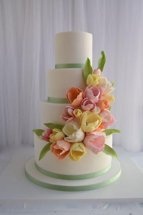 Four tier pastel wedding cake with sugar tulips Pastel Wedding Cake, Wedding Cakes Designs, Pastel Wedding Cakes, Tulip Cake, Wedding Cakes Ideas, Yellow Wedding Cake, Wedding Cake Fresh Flowers, Wedding Cake Ombre, Spring Wedding Cake