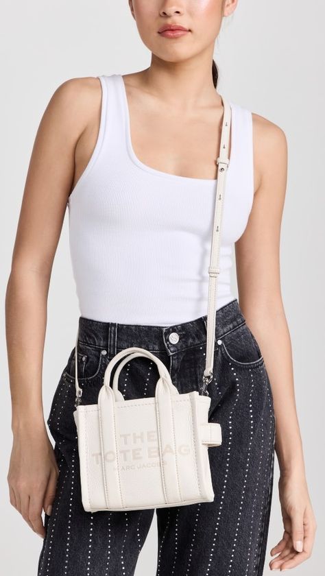 Discover great products at the best prices at Dealmoon. Marc Jacobs The Mini Tote. Price:$260.00 at shopbop.com Marc Jacobs Tote Bag, Marc Jacobs Tote, Crossbody Tote Bag, Marc Jacobs Bag, Mini Tote Bag, Crossbody Tote, Mini Tote, Argan Oil, Cotton Bag