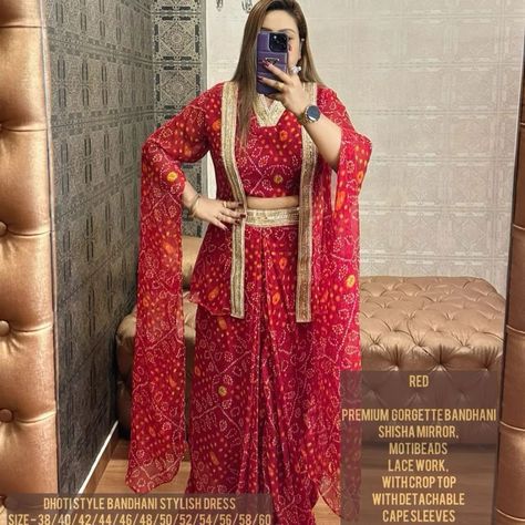 *DISPATCHING DATE - 30th July* ✅ *PLUSSIZE PREMIUM BRAND❤️* *DHOTI STYLE BANDHANI STYLISH DRESS* ❤️ *PREMIUM BANDHANI GEORGETTE*✅ *SHISHA MIRROR,MOTIBEADS LACE WORK*✅ *CROP TOP WITH DETACHABLE JACKET CAPE SLEEVES* ✅ *DHOTI STYLE COWL SKIRT* ✅ *SIZE - 38/40/42/44/46/48/50/52/54/56/58/60* ✅ *LENGTH - 57* ✅ Code sfsnoba+ *QUALITY ASSURED* 👍🏻 *BOOK YOUR ORDER FAST* To order whats app on 9082560125 #Amoolya #shortdress #salwarsuits #onepiece #green #gowncollection #readytowear #teenagers ... Bandhani Skirt With Top, Dress Pattern From Saree, Bandhani Dress Pattern, Dhoti Style Dresses, Cowl Skirt, Detachable Jacket, Bandhani Dress, Jacket Cape, Tandoori Masala