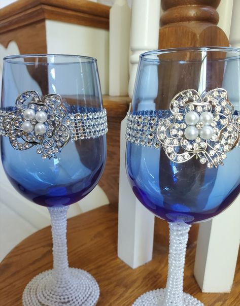 This is a set of blue glass wine glasses decorated with bling rhinestones and pearl wrap with a sparkling jewel encrusted flower. Silver Wine Glasses, Bling Rhinestones, Jewel Encrusted, Decorated Wine Glasses, Event Decor, Blue Glass, Wine Glasses, Maryland, Wine Glass