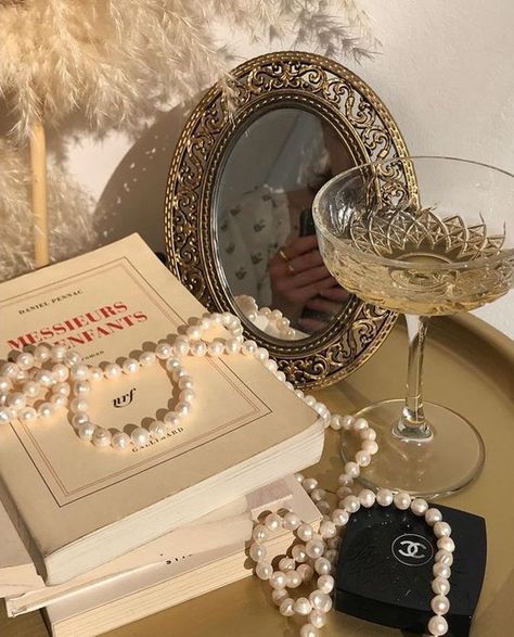 chanel // pearl bead string / chain decor ideas (linked) // gold antique home decor // coffee books // gold tray A Mirror, Wine, Mirror, Glass